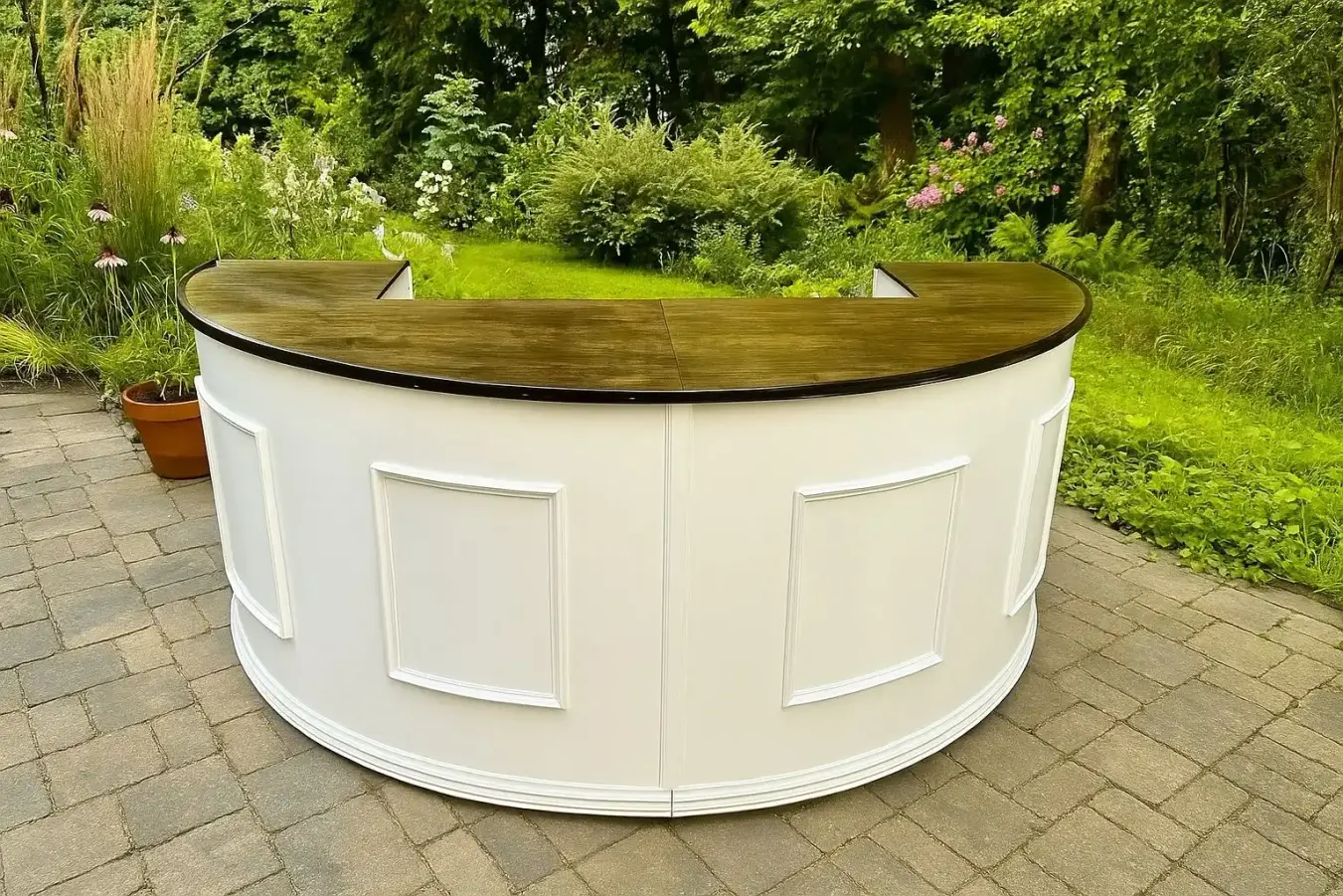 The Ground Round Bar in a lush garden setting
